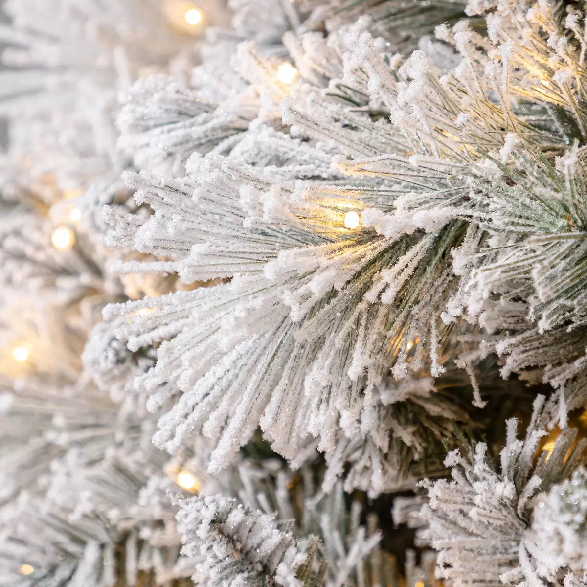 7.5ft (2.3m) Pre-Lit Glitter Flocked Artificial Christmas Tree with 1,150 Color-Changing Micro Twinkle LED Lights