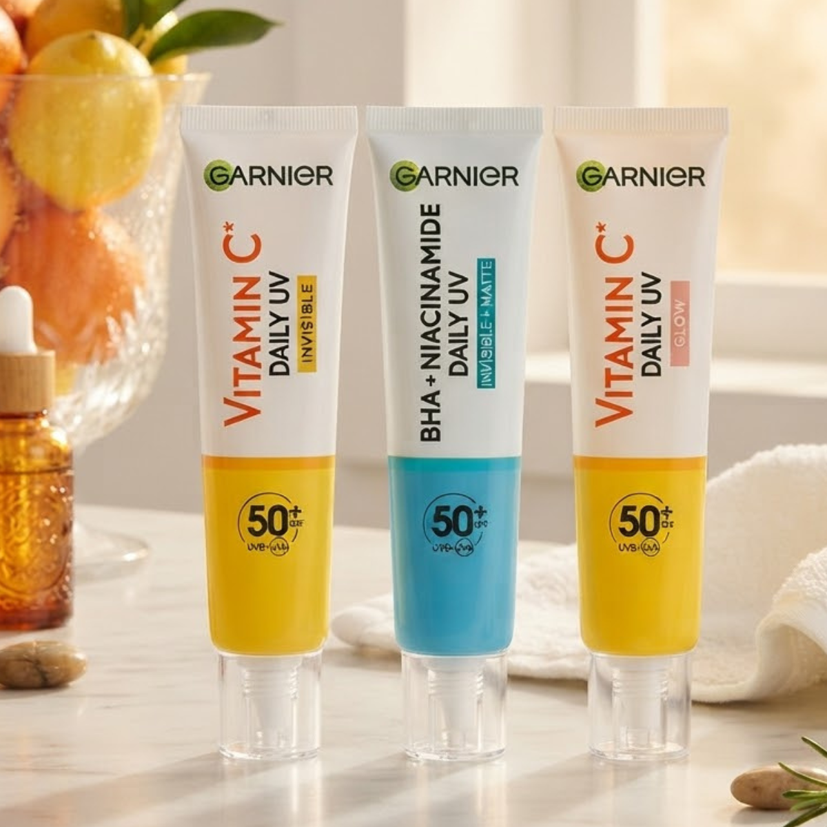 Garnier Daily UV Fluid, SPF 50+, Vitamin C Sheer Glow, Invisible & BHA+ Niacinamide